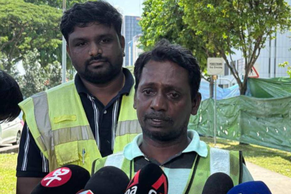 tamilnadu man rescue woman in sinkhole singapore