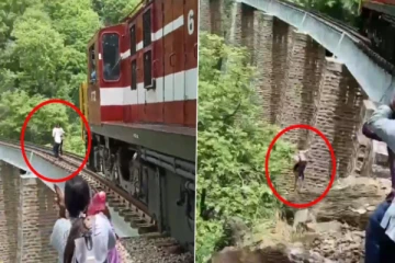 தண்டவாளத்தில் போட்டோஷூட் - திடீரென வந்த ரயிலால் 90 அடி பள்ளத்தில் குதித்த புதுமண தம்பதி!