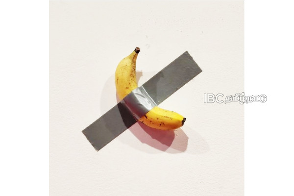 hungry-student-eats-artwork-banana-duct-taped-wall