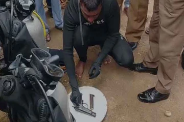 காணாமல் போன பொறுப்பதிகாரியின் துப்பாக்கி பாலத்திற்கு அருகில் கண்டுபிடிப்பு