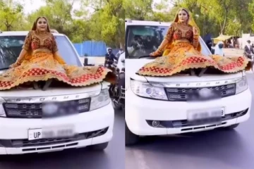 காரில் இப்படியா ஊர்வலம் போவாங்க; மணமகளுக்கு அபராதம் - வைரல் வீடியோ