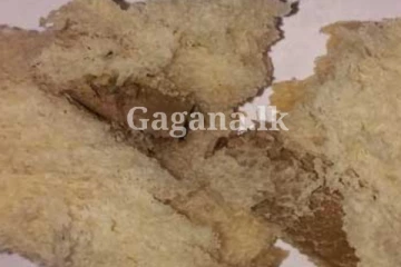 දරුවට කන්න දෙනකොටම පාන් ගෙඩිය ඇතුළේ බීඩි කොටයක් - පාන් කන එකත් නතර කළ පාන් ගත්ත අම්මා.. (PHOTO)
