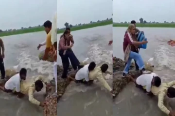 மழையால் ஏற்பட்ட பள்ளம் - மனித பாலம் அமைத்து 35 பள்ளிக்குழந்தைகளை மீட்ட இளைஞர்கள்