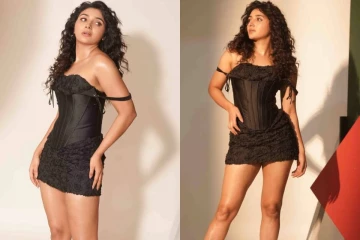 கருப்பு நிற குட்டை உடையில் மயக்கும் நடிகை மிர்ணா போட்டோ ஷுட்