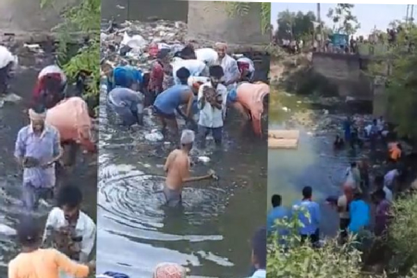 கட்டுக்கட்டாக கிடந்த ரூ.2,000 நோட்டுகள் : கழிவுநீரில் குதித்து அள்ளிய பொதுமக்கள் வைரலாகும் வீடியோ | Rs 2000 Notes Lying In Shackles People கட்டுக்கட்டாக கிடந்த ரூ.2,000 நோட்டுகள் : கழிவுநீரில் குதித்து அள்ளிய பொதுமக்கள் வைரலாகும் வீடியோ | Rs 2000 Notes Lying In Shackles People