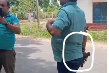 தமிழர் பகுதியொன்றில் அதிகாரிகள் அடாவடித்தனம் ; துப்பாக்கியுடன் மக்களை விரட்டியதால் பரபரப்பு