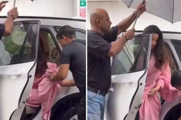 குடைபிடிக்க ஒருவர், சேலையை பிடிக்க இன்னொருவர்.. எல்லைமீறும் நடிகையை வறுத்தெடுத்த நெட்டிசன்கள் | Nora Fatehi Gets Trolled Security To Hold Saree