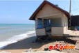 கடலலையில் சிக்கிய பொலிஸார் தங்கி இருந்த கட்டடம்