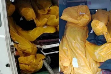 ஒற்றை ஆம்புலன்சில் 22 சடலங்கள்... கொரோனா பயங்கரம்: நெஞ்சை நொறுக்கும் புகைப்படம்