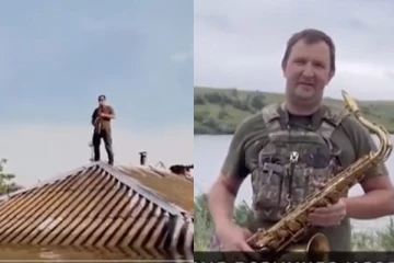 வெள்ளத்திற்கு மத்தியில் சாக்ஸபோனிஸ்டின் உக்ரைனின் தேசிய கீதம்: வைரல் வீடியோ