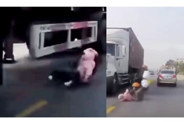 வேகமாக வந்த லாரி... விபத்தில் குழந்தை உயிரை நொடிப்பொழுதில் காப்பாற்றிய தாய் - திக்...திக்.. வீடியோ வைரல்