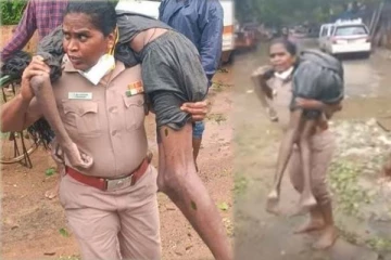 வெள்ளத்தில் சிங்கப்பெண்ணாக செயல்பட்ட பெண் காவல் ஆய்வாளர்: இளைஞரை தோளில் சுமந்து செய்த தரமான செயல்