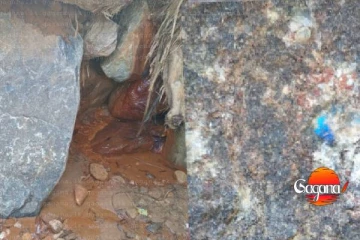 ආපදාවෙන් හානි වූ කෝවිල අසල මැණික් ගලක් යැයි සැක කරන විශාල පාෂානයක් මතුවෙයි