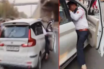 போக்குவரத்து காவலரை காரோடு இழுத்துச் சென்ற போதை ஆசாமி - பகீர் வீடியோ!