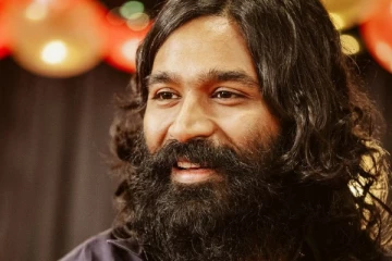 பாபா ராம்தேவ் போல் மாறிய தனுஷ்.. கலாய்க்கும் ரசிகர்கள்