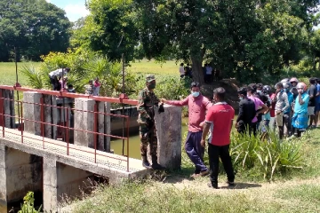 கிளிநொச்சியில் நீர் பாசன கால்வாயில் காணப்பட்ட சடலம்