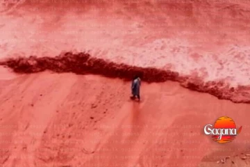 මහ වැස්සකින් පස්සේ ලේ පැහැයට හැරුණු මුහුදු වෙරළක්