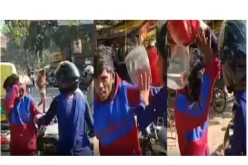 நடுரோட்டில் வாலிபரை ஹெல்மெட்டால் அடித்து வெளுத்து வாங்கிய பெண் - வைரல் வீடியோ..!