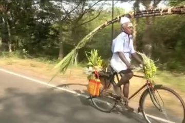 தலையில் கரும்பு, சைக்கிளில் செல்லும் தாத்தா! இணையத்தில் கலக்கும் புகைப்படம்