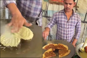 சூடான டவாவில் வெறும் கையால் அசத்தல் சமையல்: 15 லட்சத்தினரை பிரமிக்க வைத்த 25 நொடி காட்சி