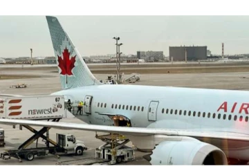 கனடாவில் 400 பயணிகளுடன் அவசரமாக தரையிறக்கப்பட்ட விமானம்