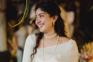 நீச்சல் குளத்தில் அவருடன் ஜாலி பண்ணும் நடிகை சாய் பல்லவி... வைரல் போட்டோ