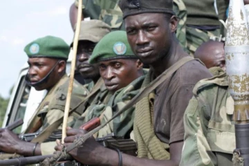 முகாம்களில் தங்கியிருந்த பொதுமக்கள் மீது துப்பாக்கி சூடு;  57 பலி