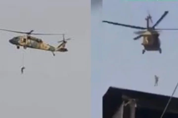 பறக்கும் ஹெலிகாப்டரில் தொங்க விடப்பட்ட மனித உடல் - தாலிபான்கள் அட்டகாசம்