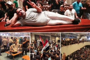 විරෝධතාකරුවන් පිරිසක් පාර්ලිමේන්තුවක් අල්ලාගනී..දැඩි උණුසුම් තත්ත්වයක්.(PHOTOS)