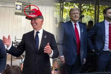 ட்ரம்ப்பின் பெயர் கொண்ட தொப்பியை அணிந்த பைடன்