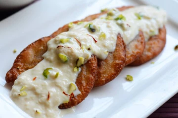 தித்திக்கும் சுவையில் மால்புவா.., இலகுவாக செய்வது எப்படி?