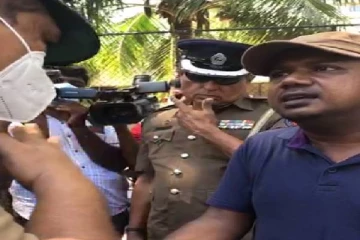 பொலிஸார் நீதிமன்ற உத்தரவை தவறாக அர்த்தப்படுத்துகின்றனர்:வீதித் தடைக்கு அருகில் பொலிஸாருடன் வாதிட்ட சட்டத்தரணி