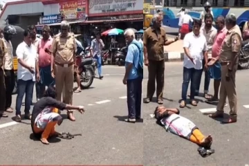 கொளுத்தும் வெயிலில் மது போதையில் சாலையில் படுத்து உறங்கிய பெண் - போக்குவரத்து பாதிப்பு