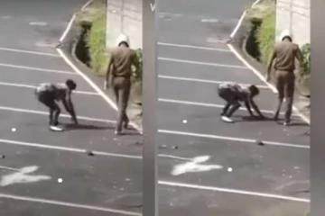 நடுரோட்டில் நபரொருவரை அடித்து  துவம்சம் செய்த பொலிஸார்!