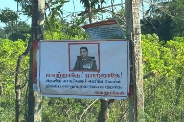 யாழில் பொலிஸ் அதிகாரியை இடமாற்றம் தொடர்பில் பொதுமக்கள் பெயரில் பதாகைகள்