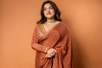 உருவக் கேலி எல்லாம் தாண்டி சாதனை படைக்கும் நிவேதா தாமஸ் புகைப்படங்கள்