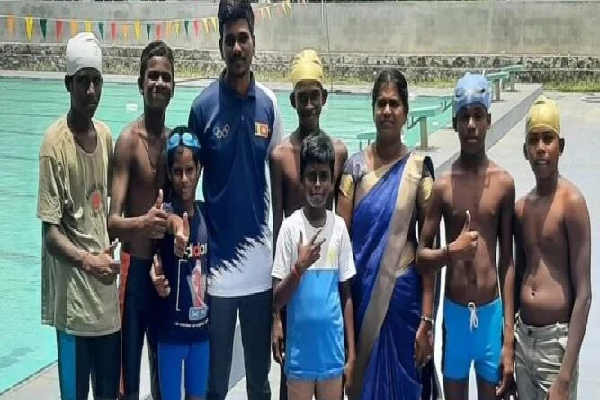 j/Tambatti School medals swiming