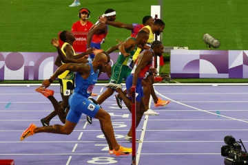 பாரிஸ் ஒலிம்பிக்; வெறும் 0.005 நொடிகள் தான் - தங்கப்பதக்கம் வென்ற அமெரிக்கா வீரர்