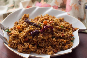 கோயிலில் கிடைக்கும் புளியோதரை போல வீட்டிலும் செய்யலாம்: எப்படித் தெரியுமா?