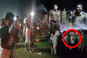 கொடிகளை அறுத்து எறிந்த காவல்துறை: தரவை துயிலுமில்லத்தில் அராஜகம்(படங்கள்)