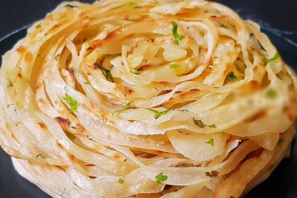 நாவூறும் சுவையில் பூண்டு பரோட்டா செய்யலாம்.. 10 நிமிட ரெசிபி | Garlic Paratha Recipe In Tamil
