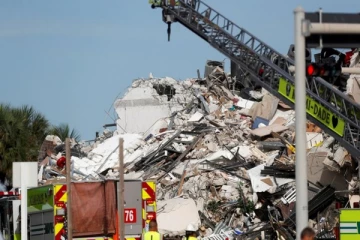 அமெரிக்காவில் அடுக்கு மாடி கட்டிடம் தரைமட்டம்: 156 பேர் மாயம்