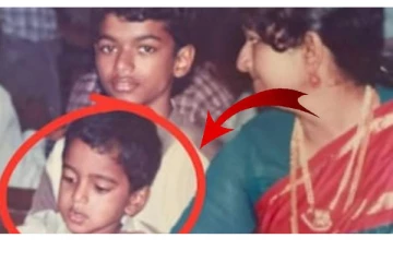 நடிகர் விஜய் மடியில் இருக்கும் சிறுவன் பிரபல நடிகர் - யார் தெரியுமா?