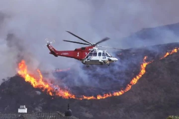 ஒருபுறம் உறையவைக்கும் பனிப்புயல்... மறுபுறம் பற்றியெரியும் காட்டுத்தீ: தத்தளிக்கும் வல்லரசு நாடொன்று