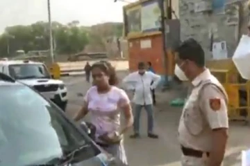 என் கணவரை முத்தமிடுவேன்: மாஸ்க் அணியாமல் போலீசாரிடம் வாக்குவாதம் செய்த தம்பதியினர்- வைரல் வீடியோ