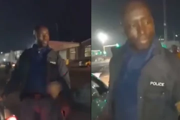 பொதுமக்களுடன் சேர்ந்து பொருட்களை சூறையாடும் பொலிசார்... தென்னாப்பிரிக்காவில் தலைவிரித்தாடும் வன்முறை