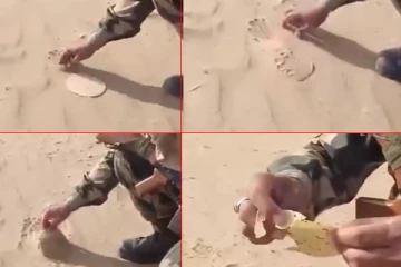 பாலைவன மணலில் அப்பளம் சுடும் ராணுவ வீரர் ; வைரலாகும் வீடியோ