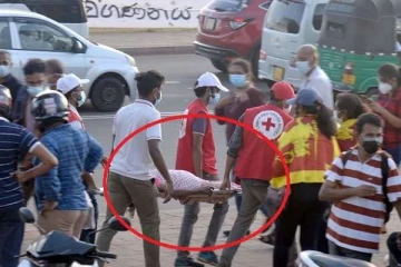 போராட்டத்தில் திடீரென மயங்கி விழுந்த பெண்ணால் பரபரப்பு!