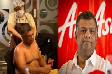 மேலாடையில்லாமல் மசாஜ் செய்தபடி மீட்டிங்கில் ஏர் ஏசியா விமான நிறுவன CEO - அவர் கொடுத்த விளக்கம்?
