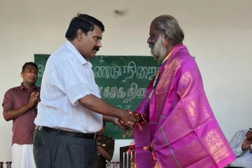 யாழில் தலை முடியினால் வாகனத்தை இழுத்து சாதனை (Photos)